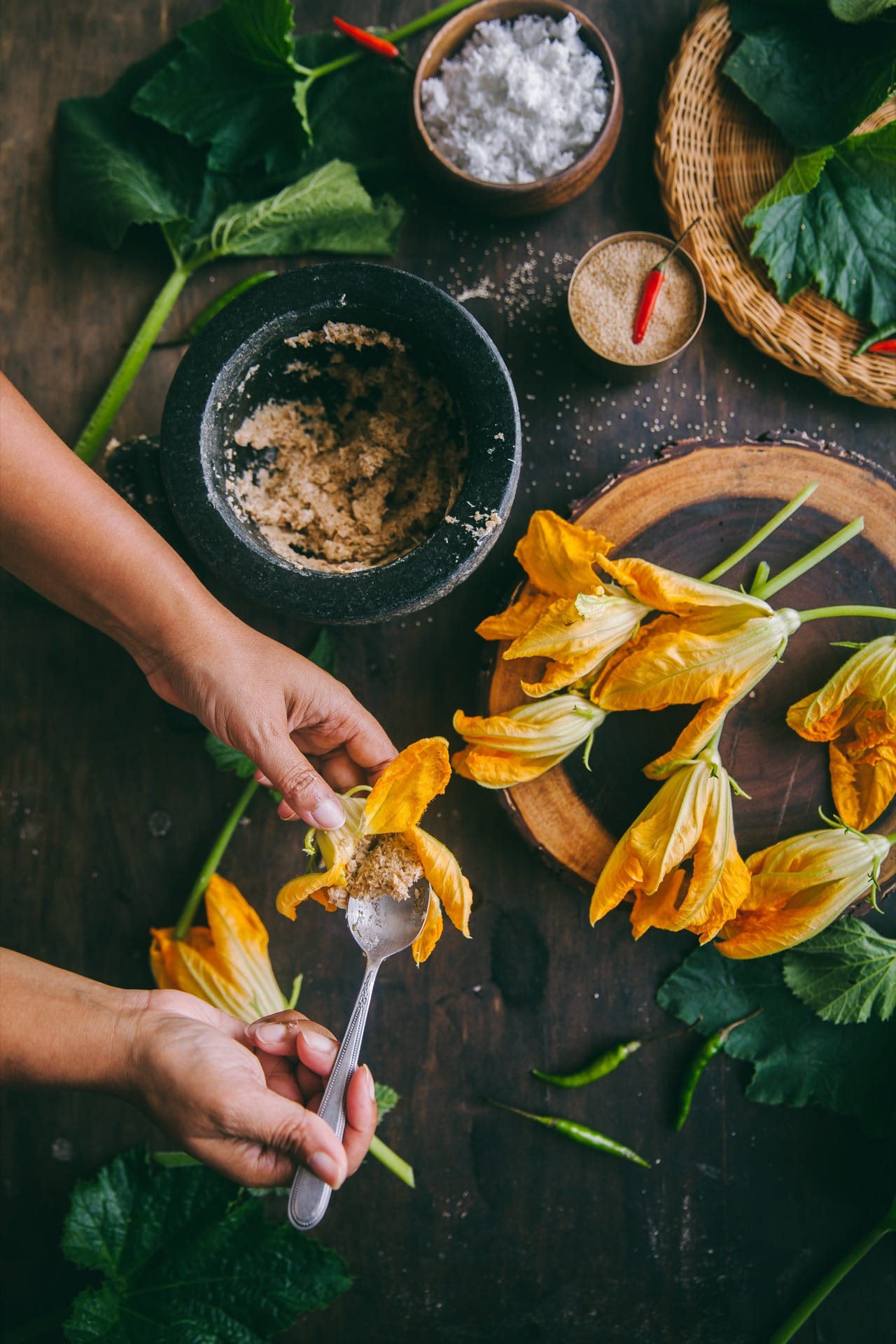 Three squash blossoms filled with goat cheese.